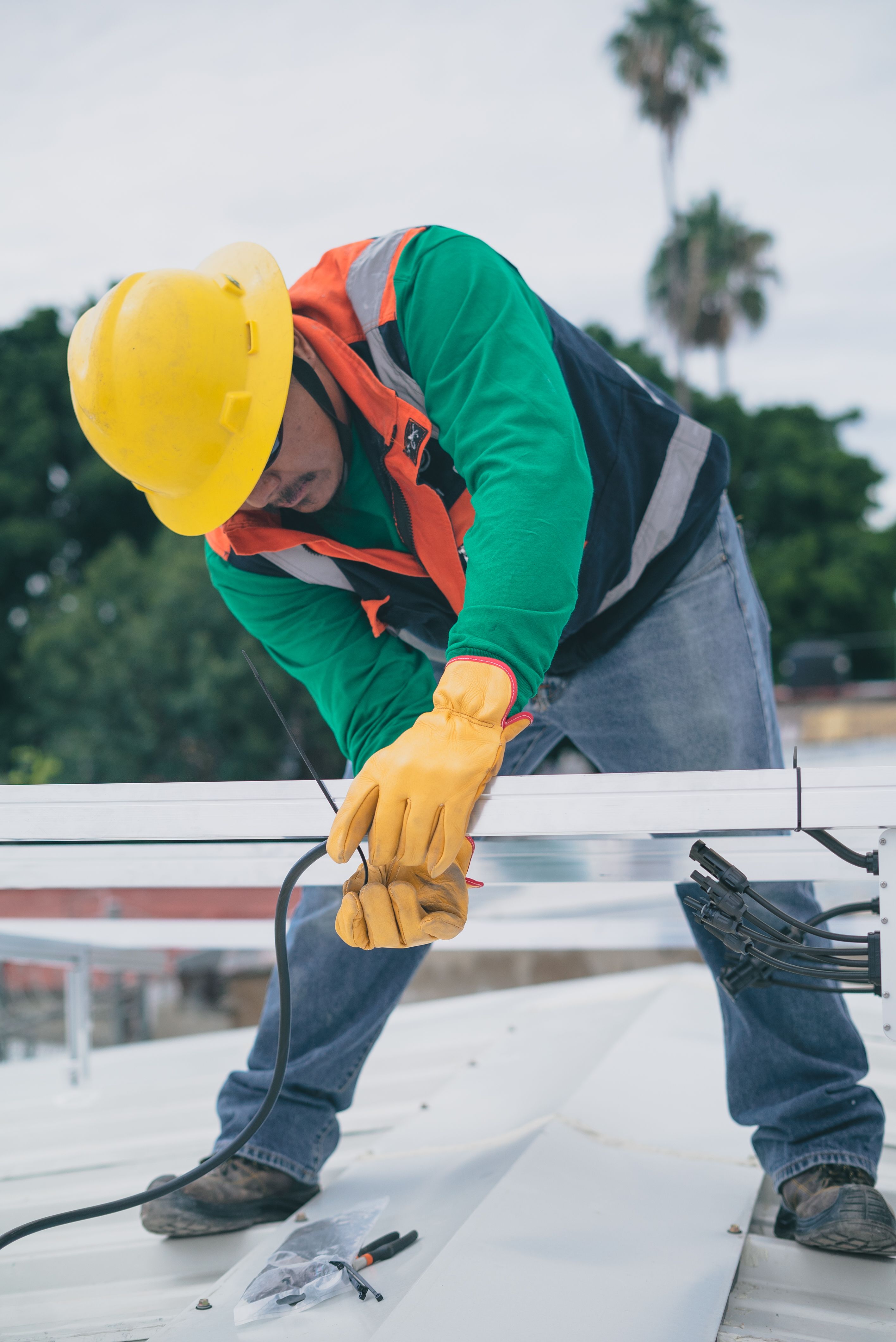Electrician working safely on electrical system